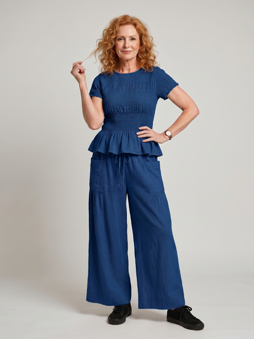Eirenne | Krokots tops ar peplum detaļu un platu staru bikšu komplekts