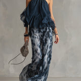 Ludoviča | Stilīgs tumši zils komplekts ar plecu augšdaļu un platām biksēm ar apdruku
